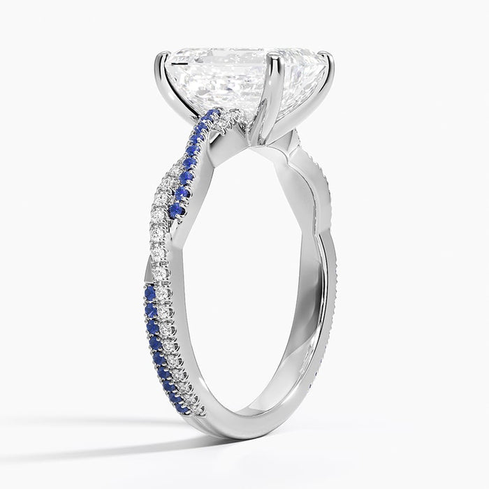 Profile view showing the sapphire and diamond strands crossing along the band
