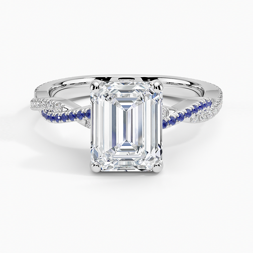 Emerald cut lab grown diamond ring in white gold with a blue sapphire strand twisted against a diamond strand, top view
