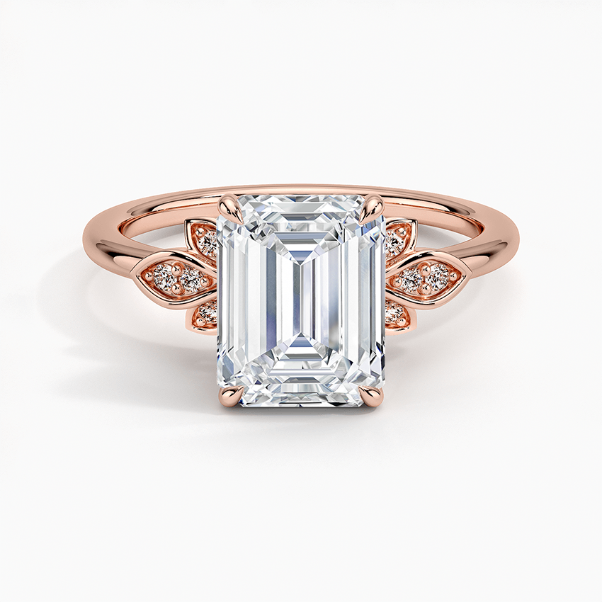 Emerald cut lab grown diamond ring in rose gold with pave set leaf clusters at the shoulders, top view