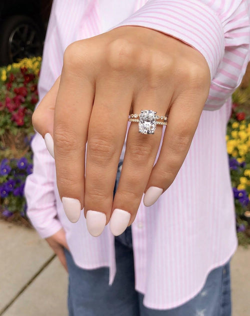 Radiant cut lab grown diamond halo bridal ring set with marquise and round eternity band in yellow gold