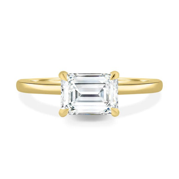 East west emerald hidden halo ring side view