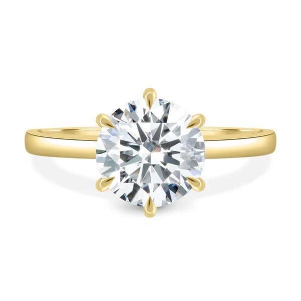 Six claw round cut diamond solitaire engagement ring