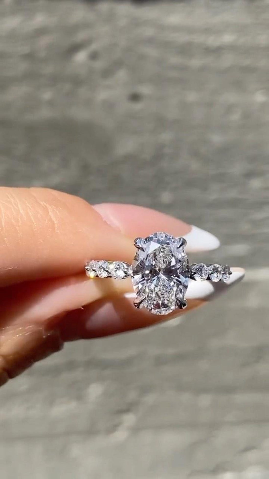 Oval cut lab grown diamond engagement ring with floating bubble diamond band in white gold
