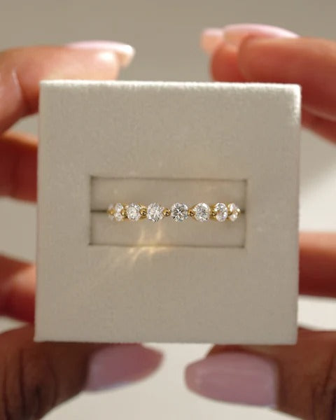 Shared prong diamond wedding ring