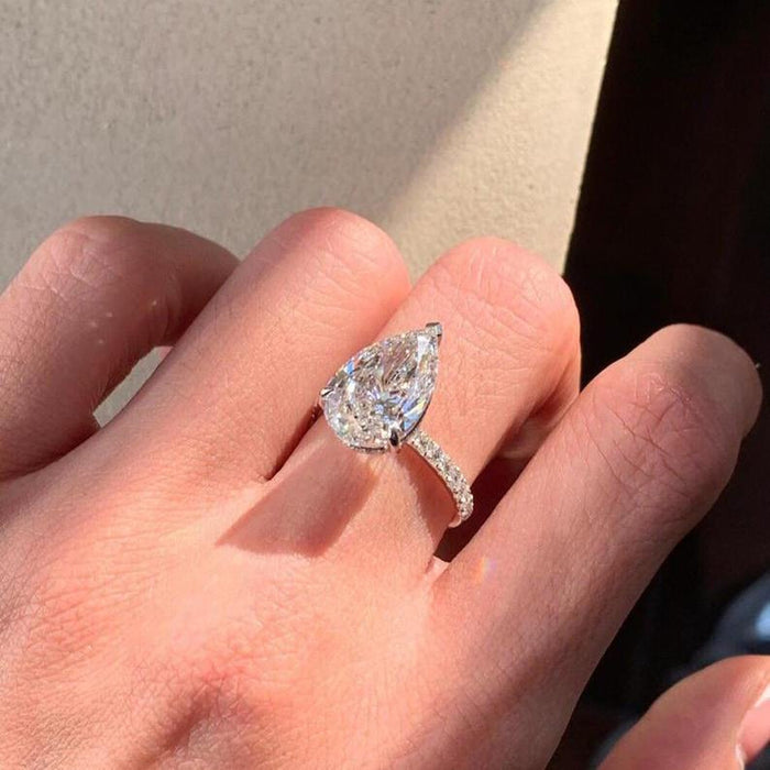 Pear cut lab grown diamond white gold ring angled view