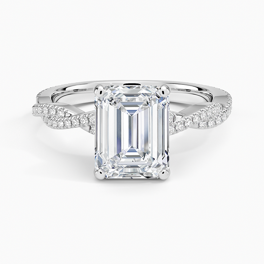 Emerald cut lab grown diamond ring in white gold on a fine pave infinity twist band, top view