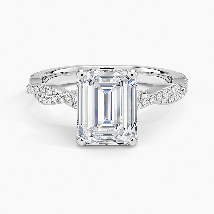 Emerald cut lab grown diamond ring in white gold on a fine pave infinity twist band, top view