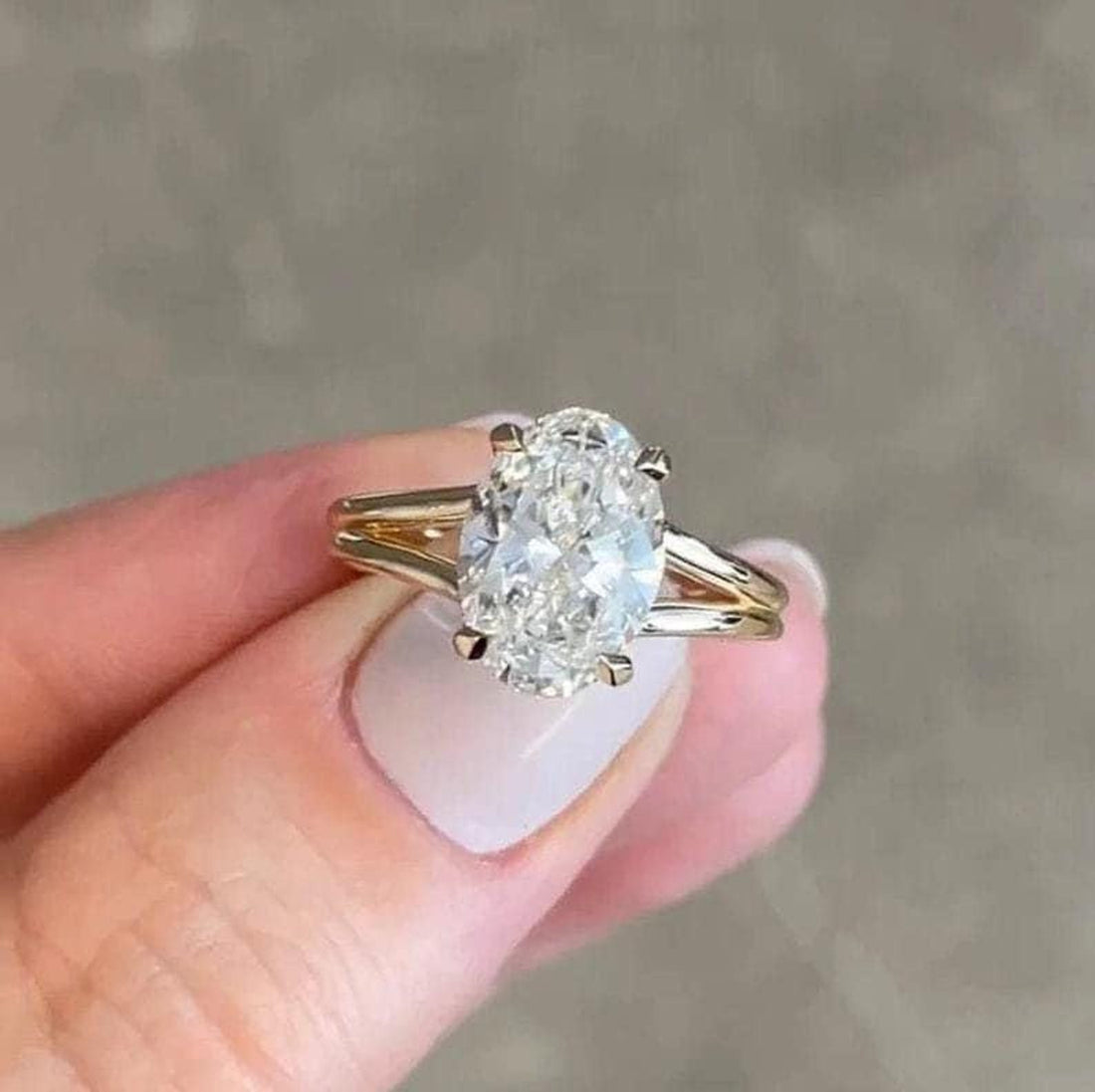 Hidden halo detail on oval cut lab grown diamond split shank ring