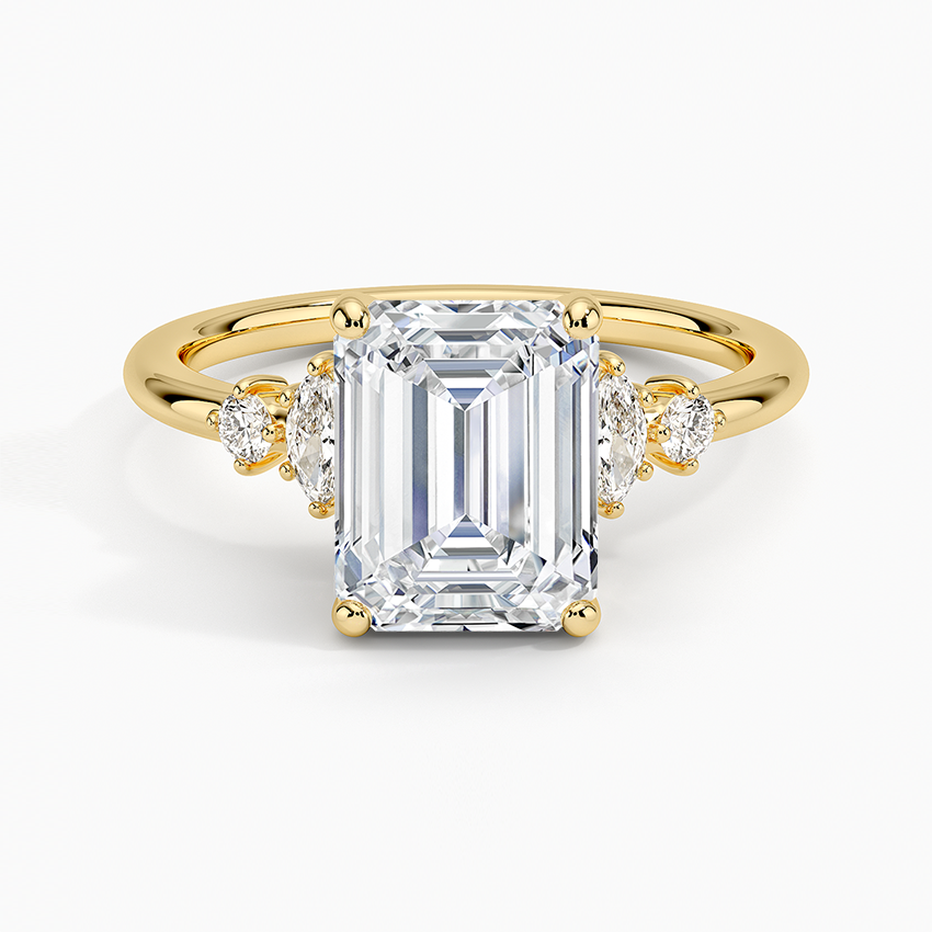 Emerald cut lab grown diamond ring with marquise and round five stone accents in yellow gold, top view