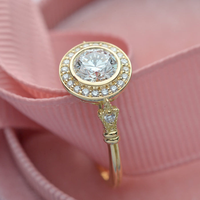 Round lab grown diamond bezel halo engagement ring