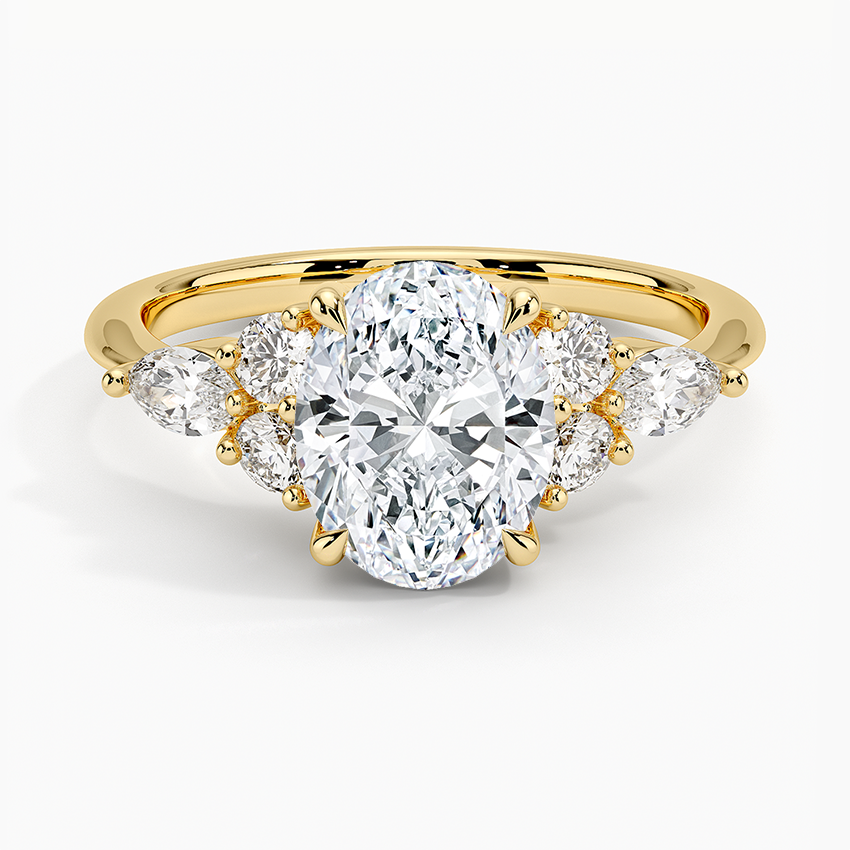 Oval cut lab grown diamond ring with fanned round and marquise accents in yellow gold, top view