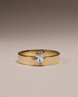 North east pear cut diamond solitaire ring