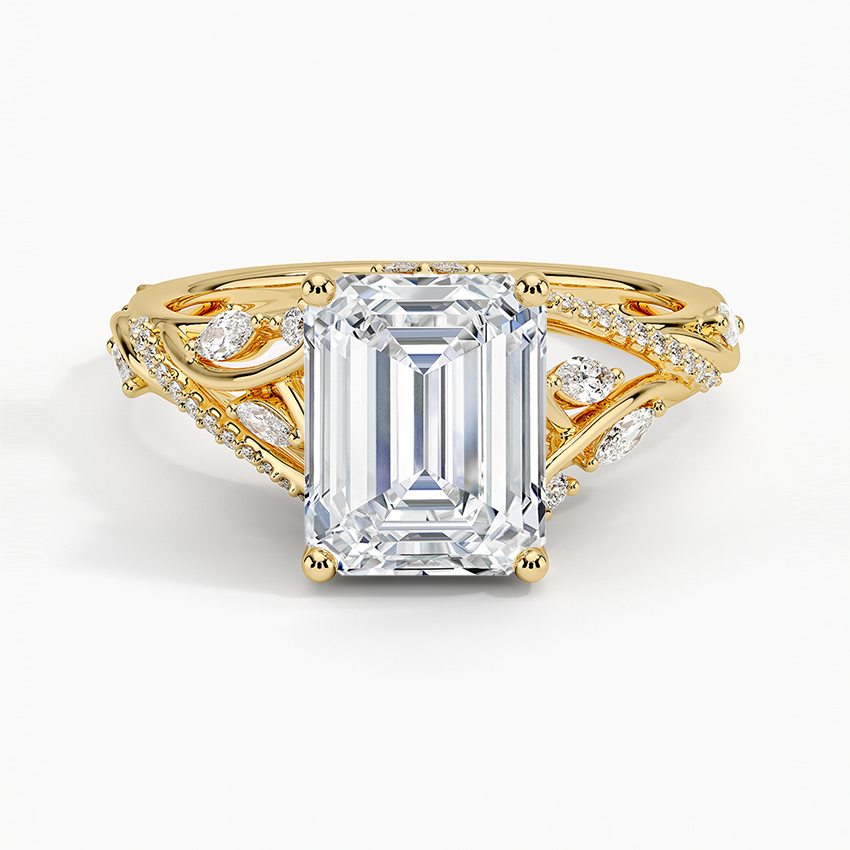 Emerald cut lab grown diamond ring in yellow gold with open branch vine band and marquise leaf diamonds, top view