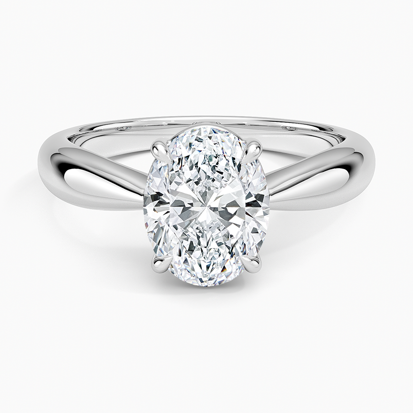 Oval cut lab grown diamond solitaire ring with V notched domed shoulders in white gold, top view