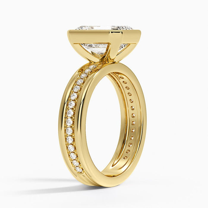 Side profile showing the low full bezel and the pave row between two polished rails