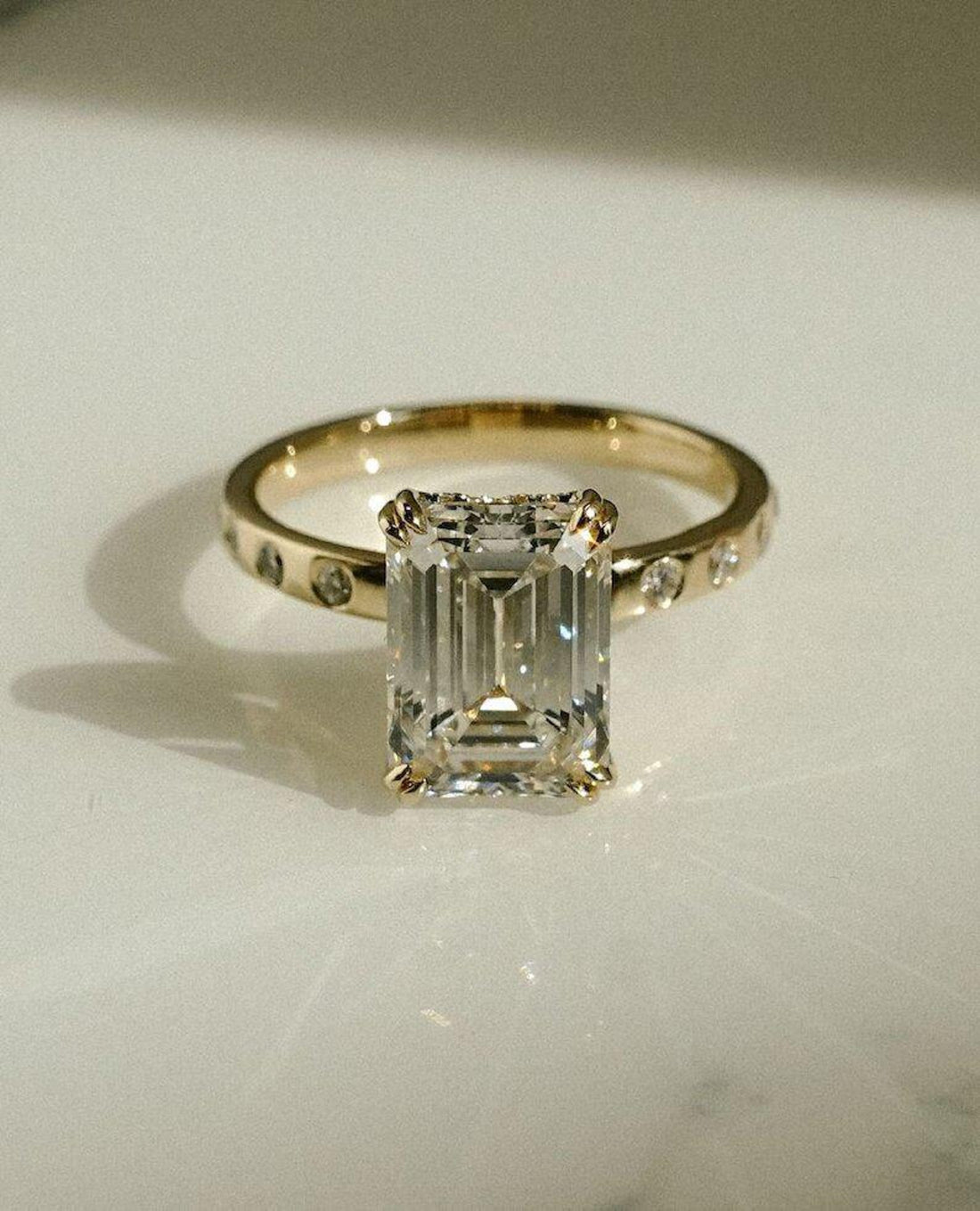 Hidden halo beneath the emerald cut lab grown diamond centre stone