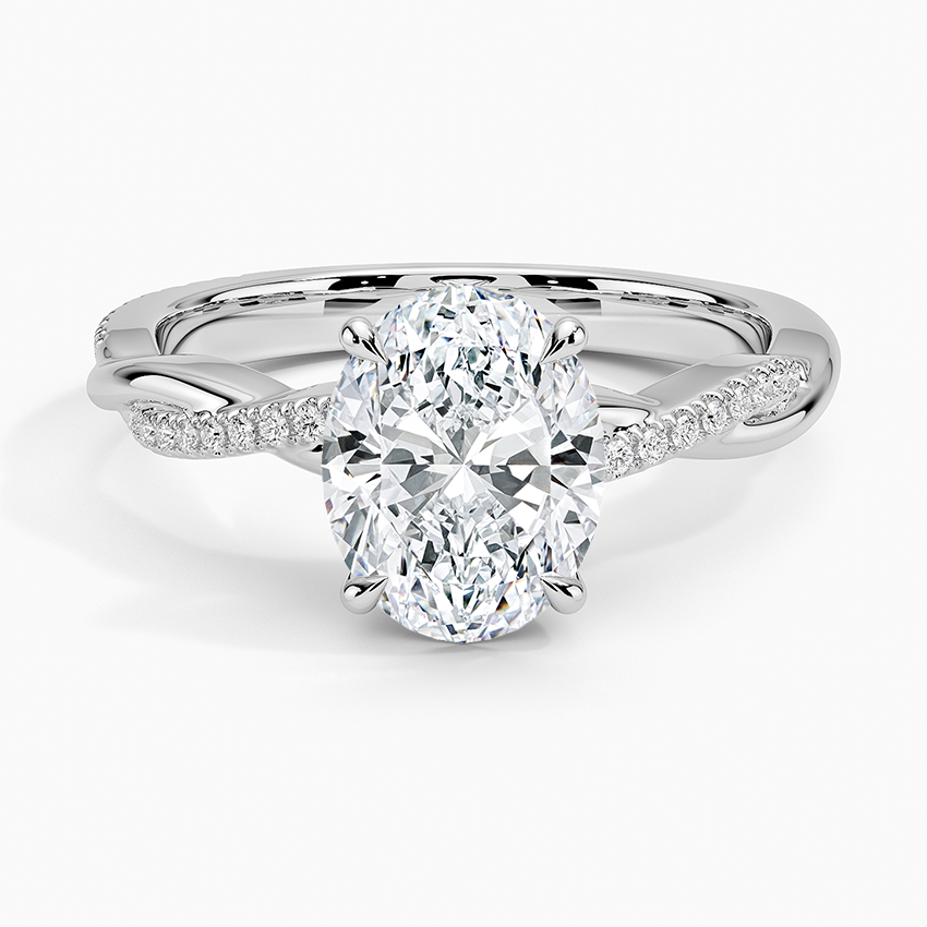 Oval cut lab grown diamond ring on a twisted pave and polished vine band in white gold, top view