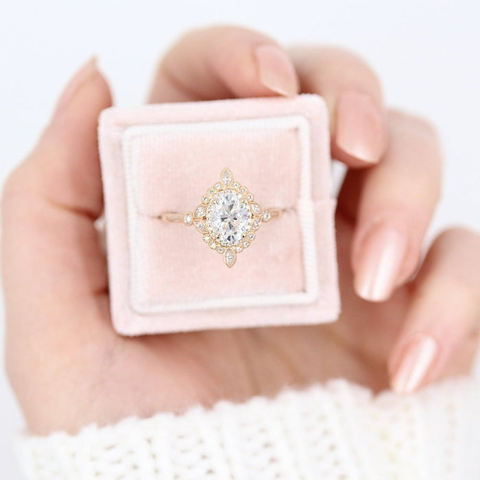 Oval lab grown diamond compass star halo engagement ring