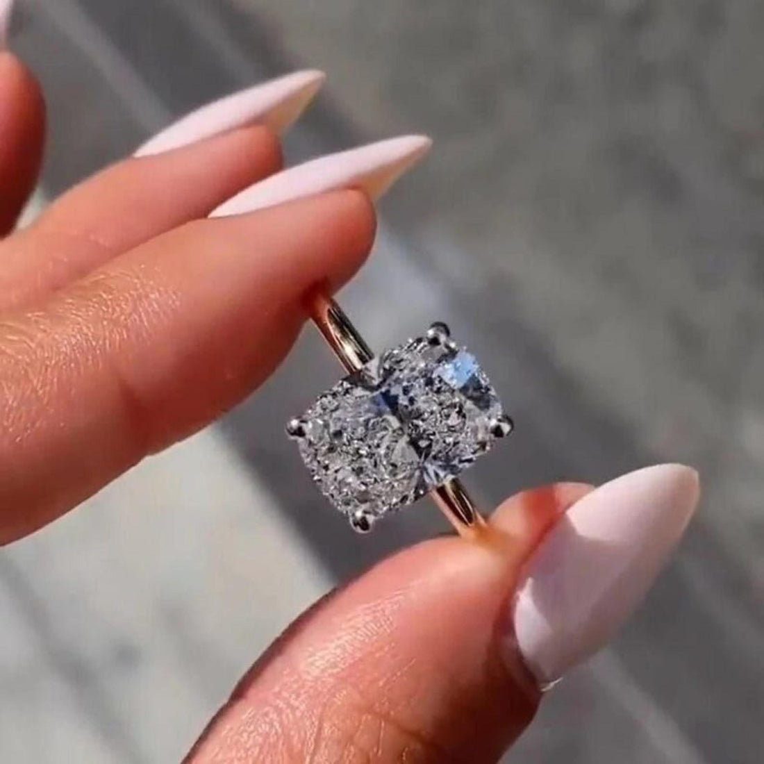 Top view of the elongated cushion hidden halo engagement ring