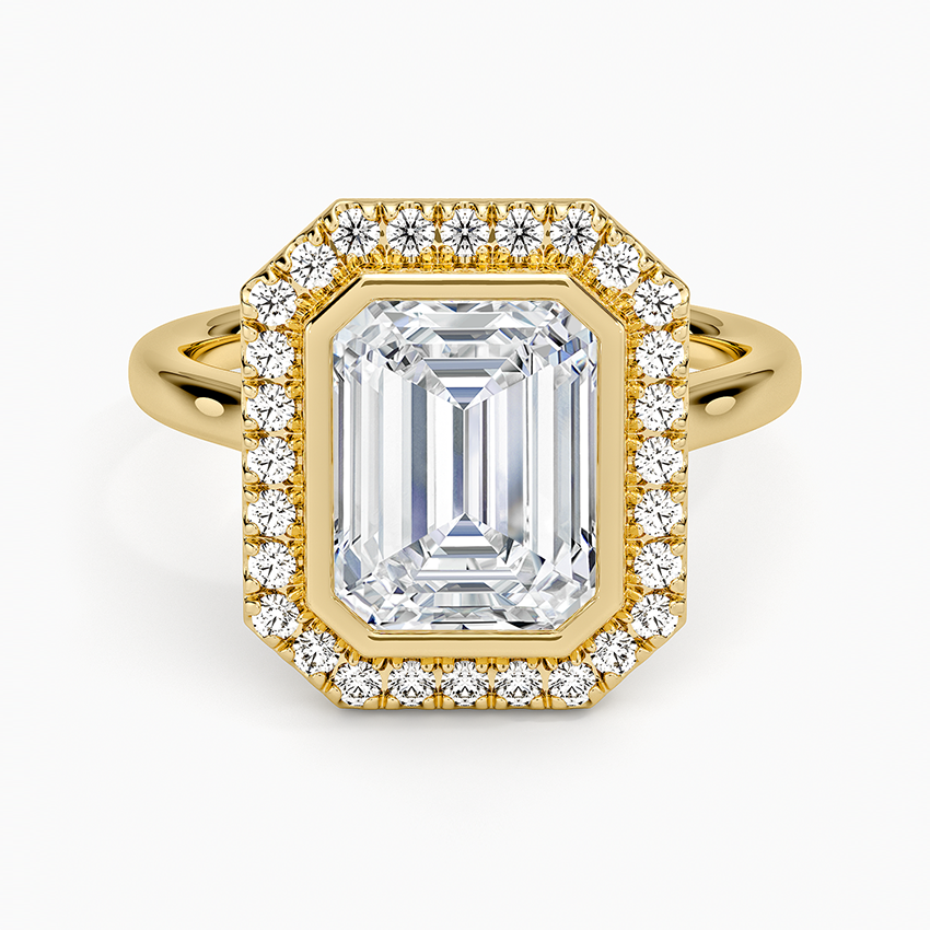 Emerald cut lab grown diamond ring in yellow gold with full bezel and pave halo, top view