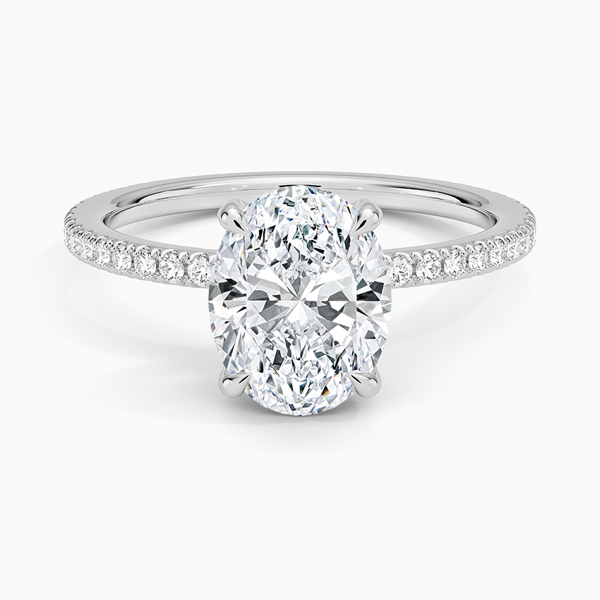 Oval cut lab grown diamond ring on a full coverage pave white gold band, top view