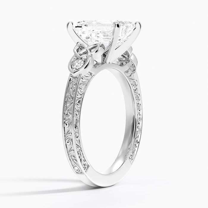 Profile view showing the pierced knot work and pave along the band edge