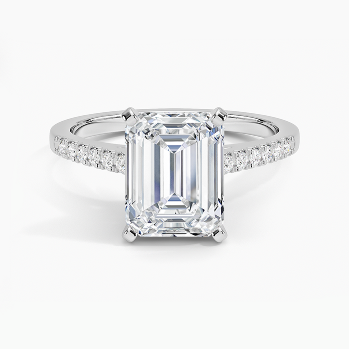 Emerald cut lab grown diamond ring with slim cathedral pave shoulders in white gold, top view