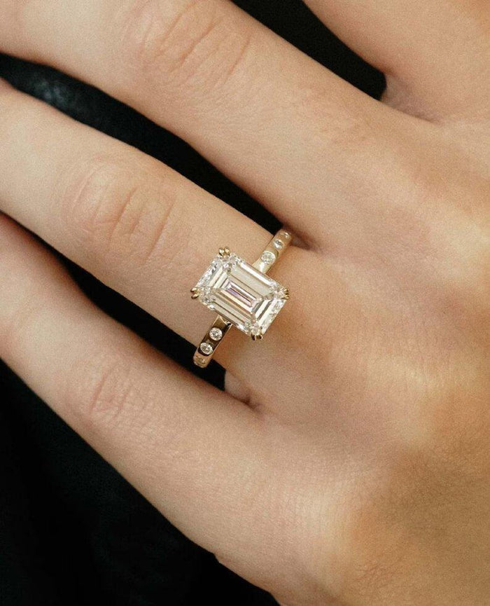 Close up of E color VVS2 emerald cut lab grown diamond step facets