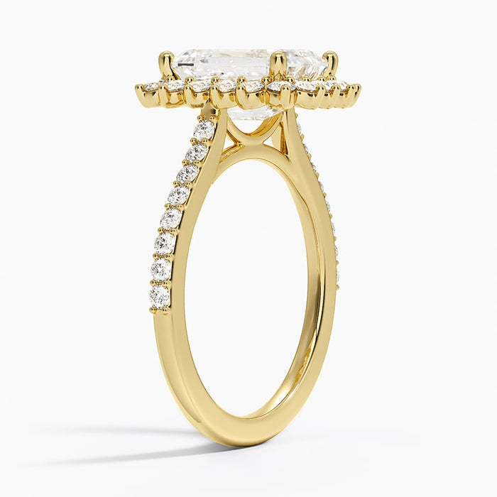 Profile view showing the graduated halo stones and pave along the band
