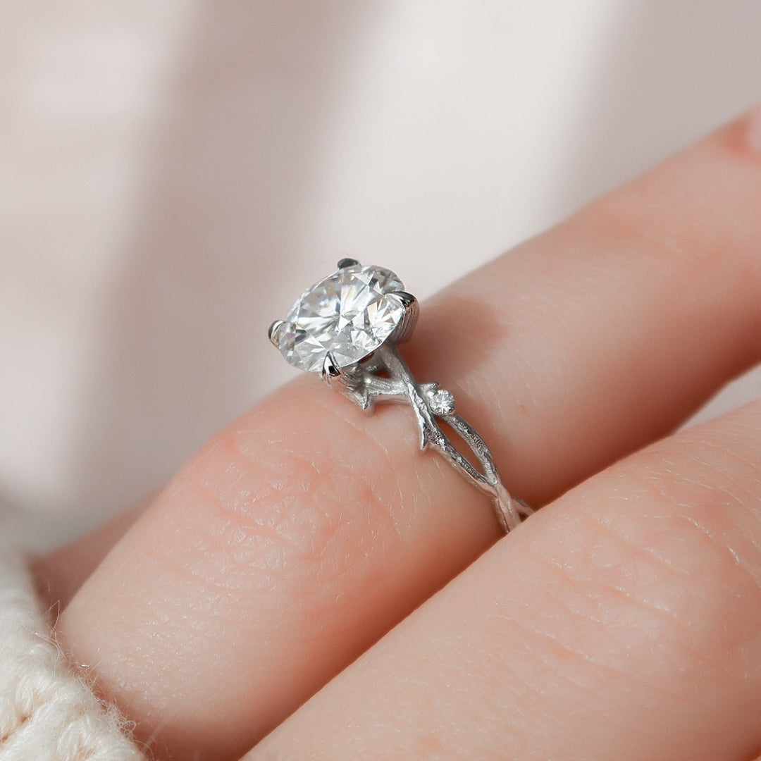 Round cut lab grown diamond ring on a carved twig band in white gold