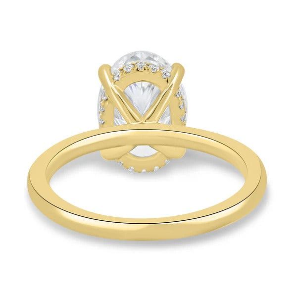 Oval cut diamond solitaire ring with hidden halo