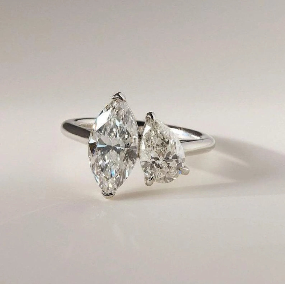 Toi et moi marquise and pear cut lab grown diamond engagement ring in white gold