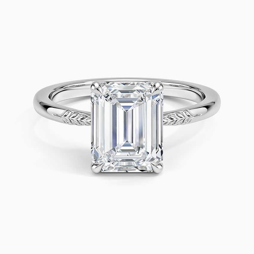 Emerald cut lab grown diamond ring with hand engraved leaf shoulders in white gold, top view