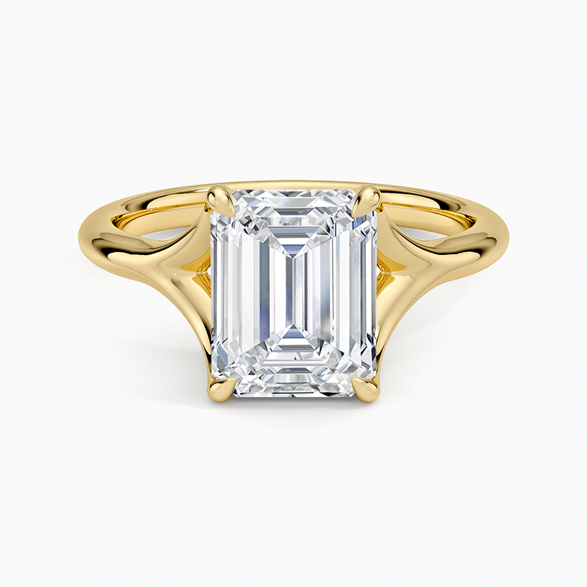 Emerald cut lab grown diamond solitaire ring in yellow gold with flared split shank, top view