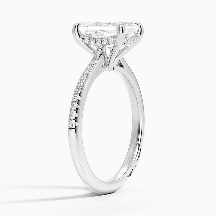 Side profile showing the hidden halo and split gallery on a very slim pave band