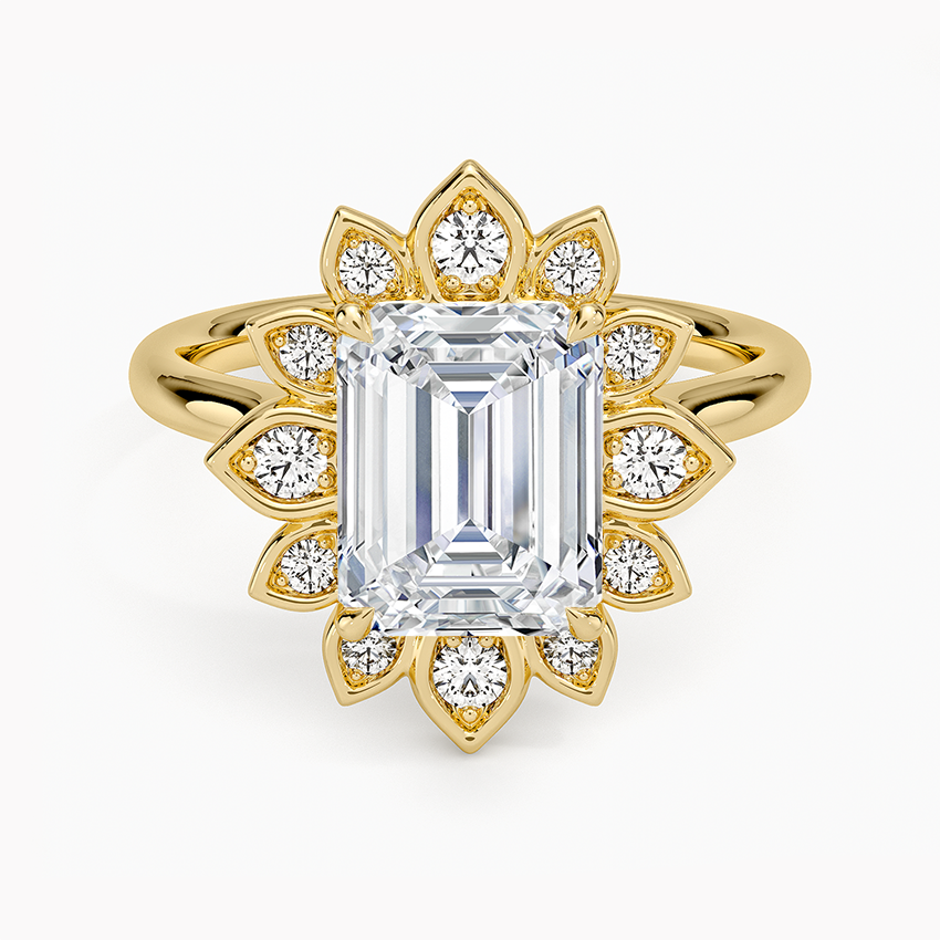 Emerald cut lab grown diamond ring in yellow gold with floral petal halo and milgrain bezels, top view