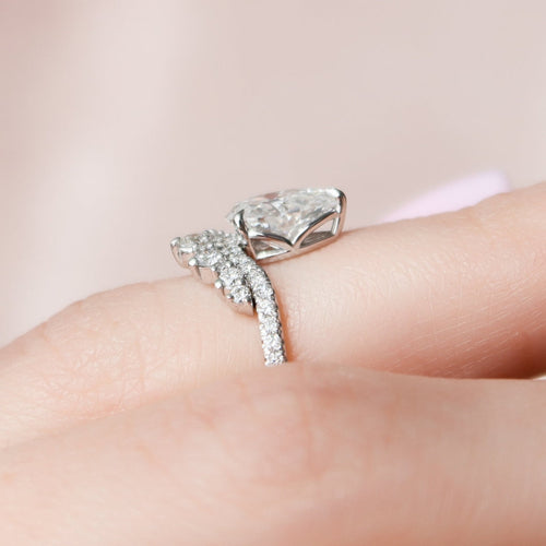 Pear cut lab grown diamond bridal ring set with a contoured crown band