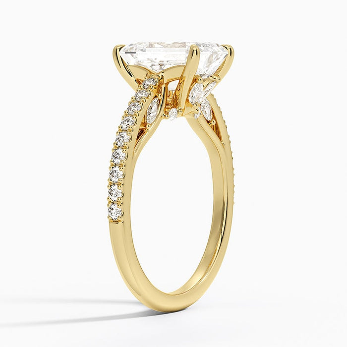 Side profile showing the hidden marquise blossom gallery under the centre stone