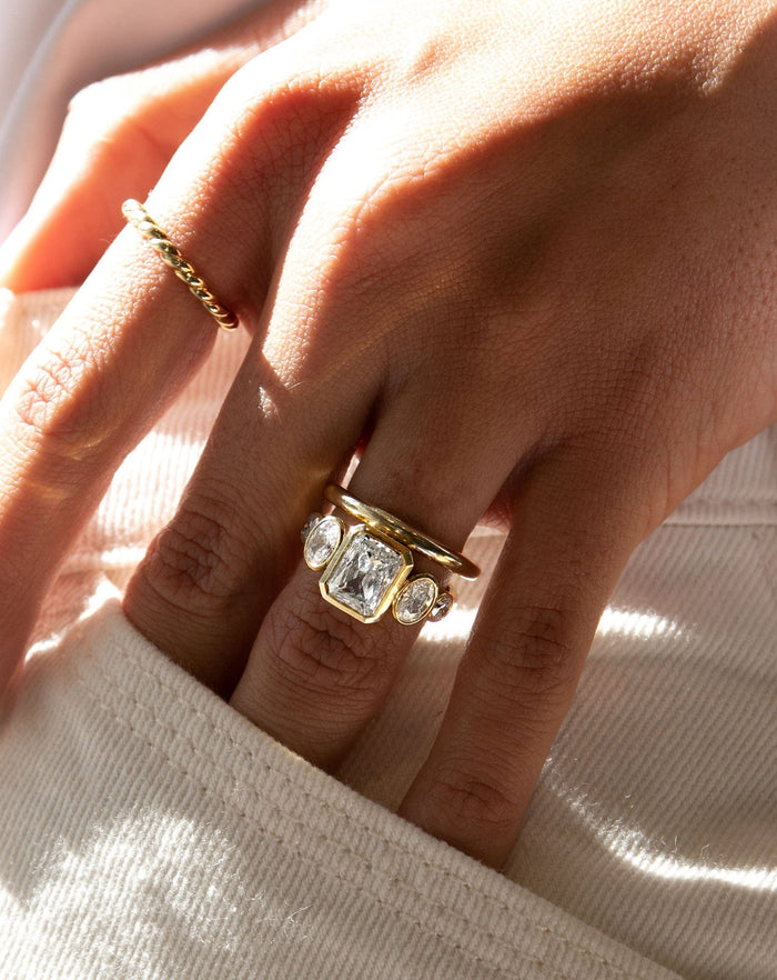 Radiant cut lab grown diamond five stone bezel engagement ring