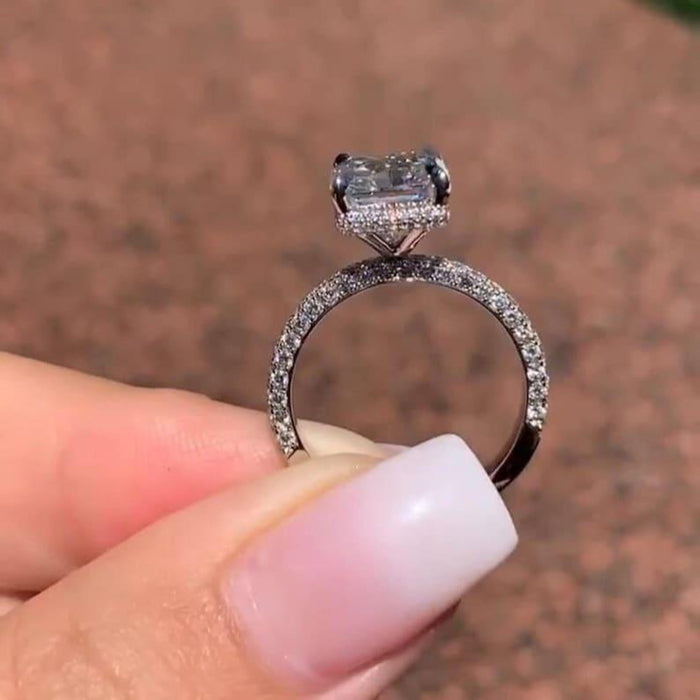 Radiant cut lab grown diamond hidden halo engagement ring angled view