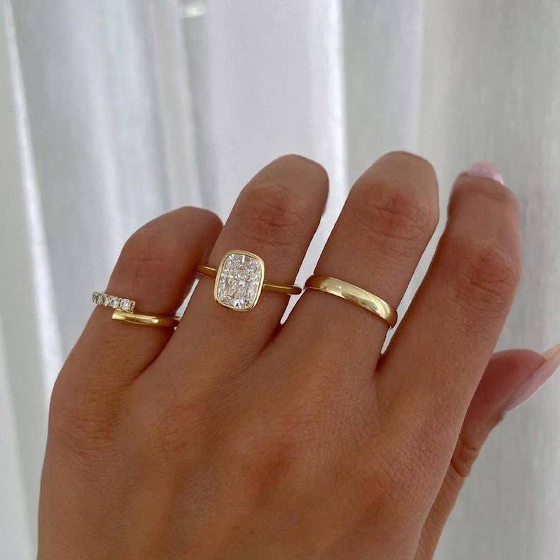 Elongated cushion cut lab grown diamond full bezel solitaire ring