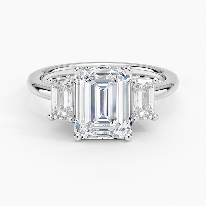 Emerald cut lab grown diamond three stone ring in white gold with matching emerald cut sides, top view