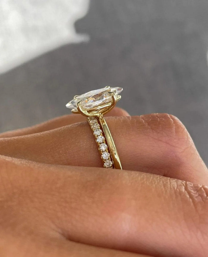 Profile of the marquise cut ring showing the pave set shoulders