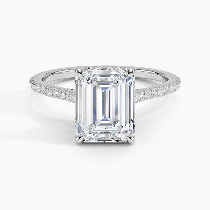 Emerald cut lab grown diamond ring in white gold on a micro pave knife edge band, top view