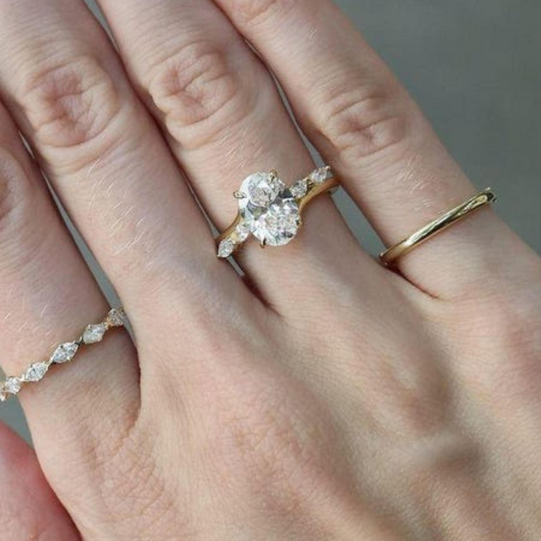 Oval cut lab grown diamond Art Deco three stone cluster ring