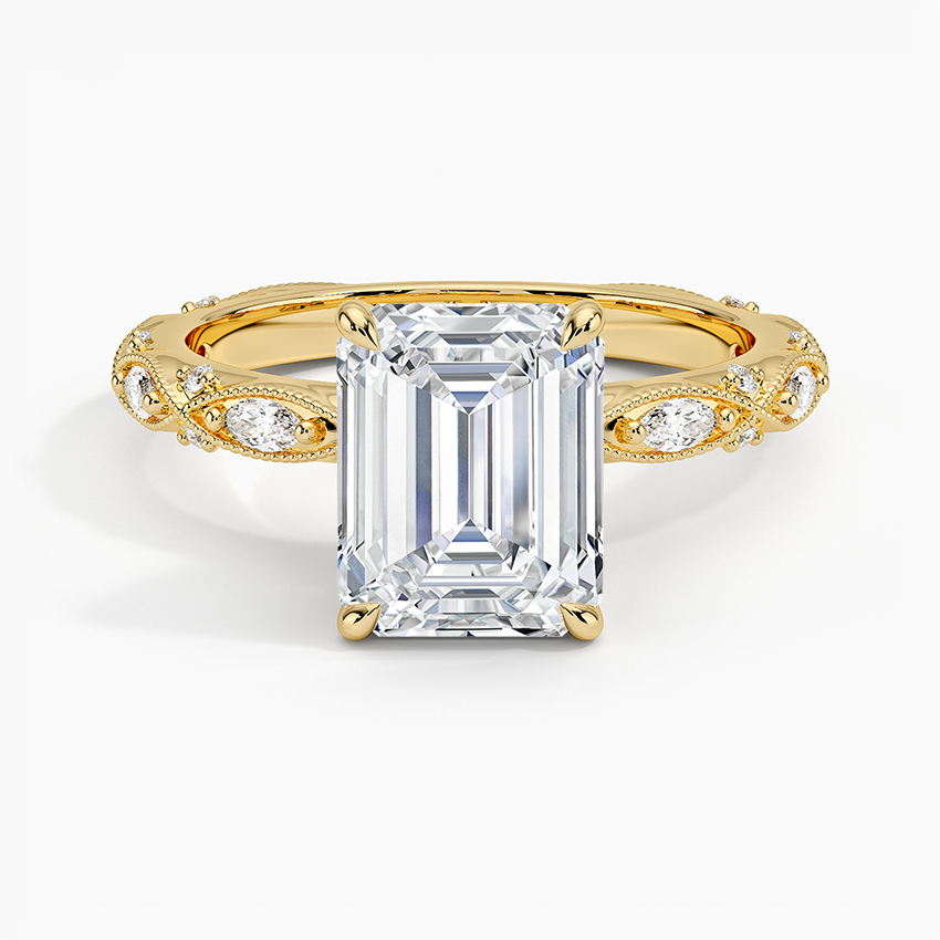 Emerald cut lab grown diamond ring in yellow gold with milgrain marquise and dot vintage band, top view
