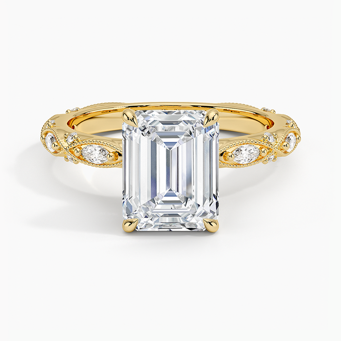 Emerald cut lab grown diamond ring in yellow gold with milgrain marquise and dot vintage band, top view