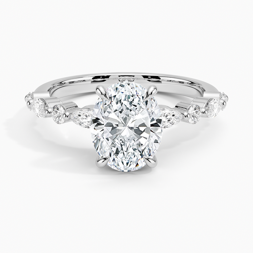 Oval cut lab grown diamond ring with marquise and round accents in white gold, top view