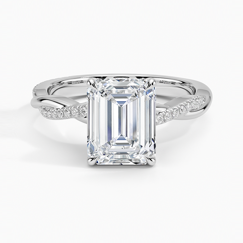 Emerald cut lab grown diamond ring in white gold on a pave twisted infinity band, top view