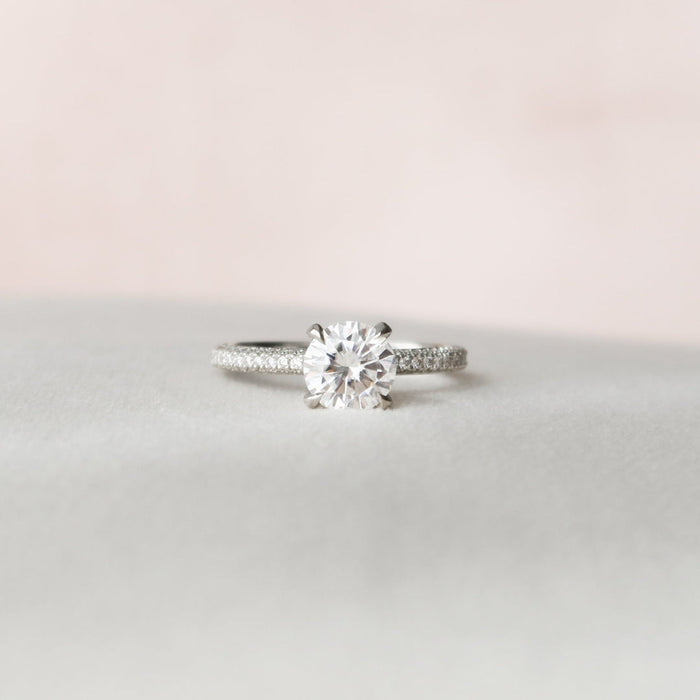 Round cut lab grown diamond ring on a three sided micropave shank in white gold